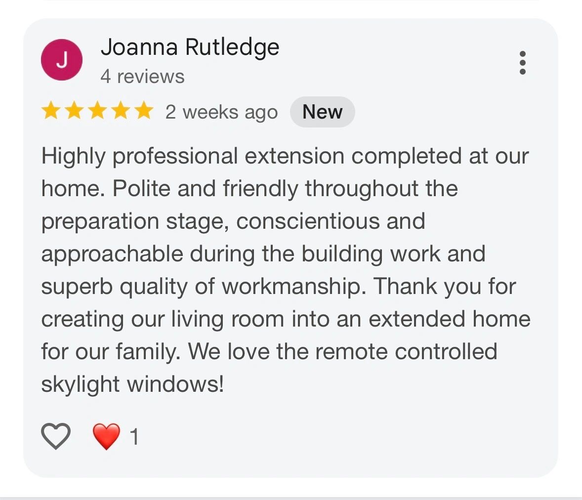 Positive review praising professional home extension with quality workmanship and remote-controlled skylight windows.