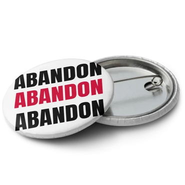 Round pin button with 'ABANDON' repeated, middle word in red.