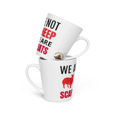 Two white coffee mugs with humorous sheep and goats text and images.