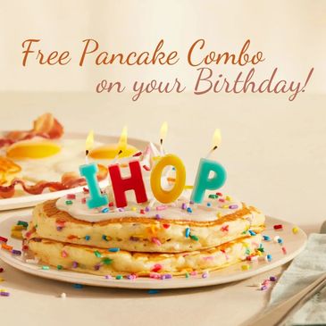 Birthday pancakes with IHOP candles and sprinkles.