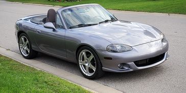 Speedy the 2005 Mazdaspeed Miata back to stock and looking fine.