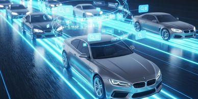 Futuristic autonomous cars connected via digital networks on a highway.