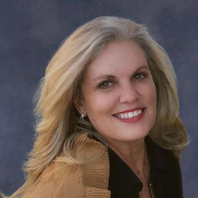 Image of Clover Shearey, CEO of Excel Advertising AI, advertising agency executive, car ads, marine