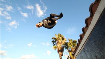 An extreme sports athlete performing an acrobatic stunt