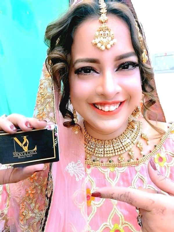 Bridal makeover with stunning hairdo at Nicky & Laila Salon in Askari 11 – book your day.