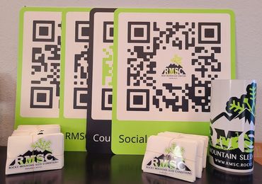Rocky Mountain Sled Conditions signs for booths