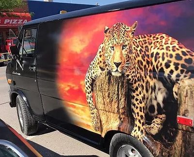Custom designed cheetah wrap for van.