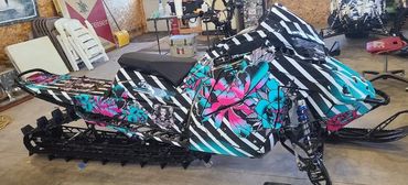 snowmobile wrap with stripes and flowers