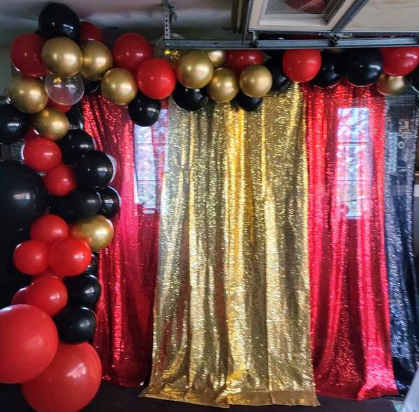 red, black and gold organic balloon garland