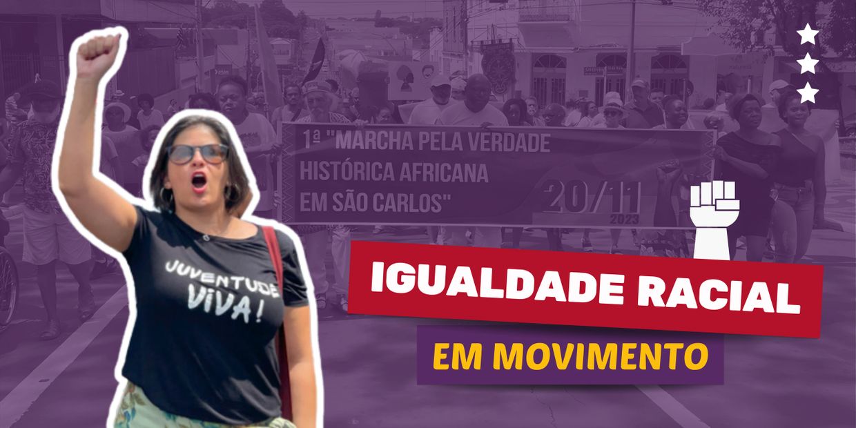 Woman raising fist in a racial equality march in São Carlos.