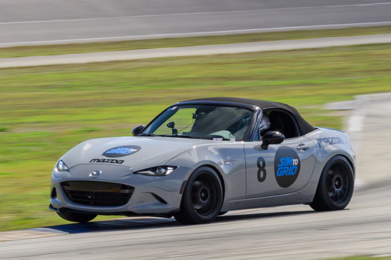 Race car on track with Sim to Grid, Stuart Florida