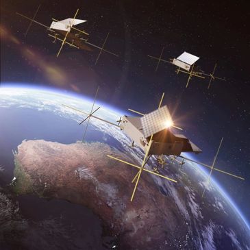 Artists impression of 3 Skykraft satellites orbiting Earth from space showing Australia