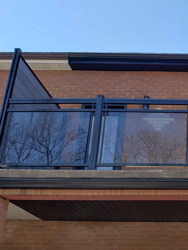 second floor balcony glass railings