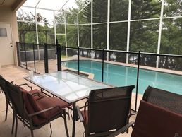 This Pool Fence was installed on the upper level keeping the kids safer and away from the steps.