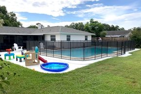 With an oversized swimming pool, a pool fence is the only solution to keeping the kids safer at home