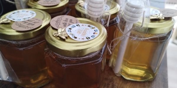 Group of honey filled jars