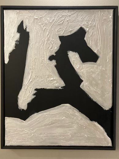 Abstract black and white textured painting with bold shapes and rough white paint strokes.
