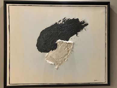 Abstract painting with textured black and beige shapes on a light background.