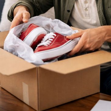 A Finder packaging a Keepers Item for them to ship