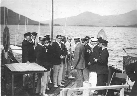 Group of men socializing on a boat.