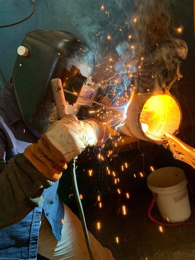 Student welding on Pipe using the SMAW welding process. 