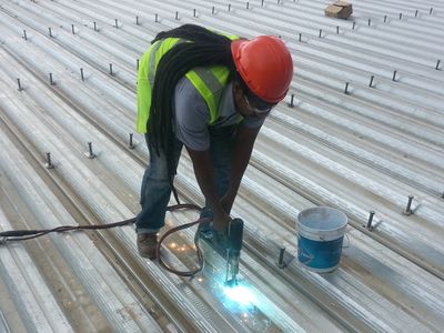 Arcon Electric Stud Welder in use.