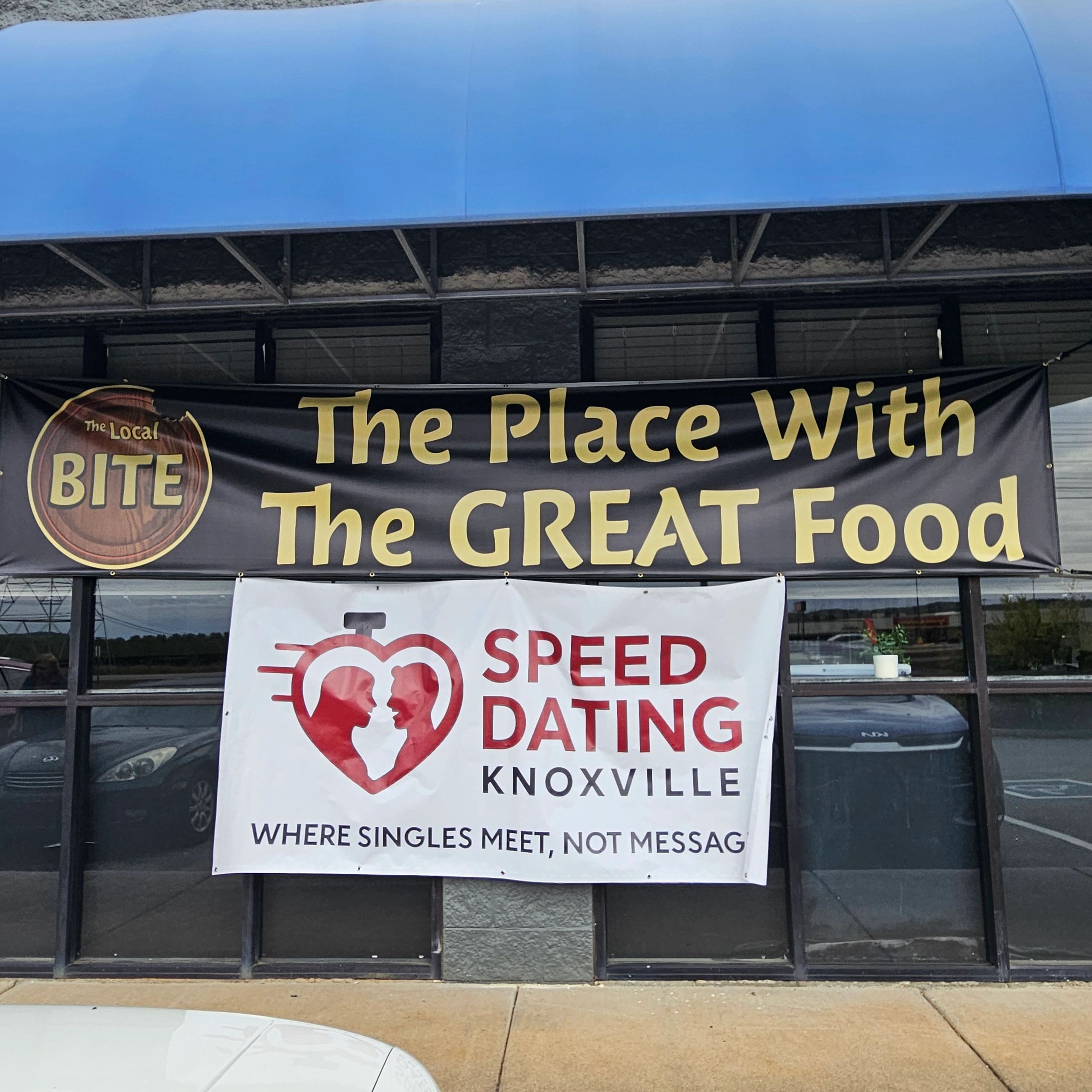 Local craft beer and sausage kitchen signs.