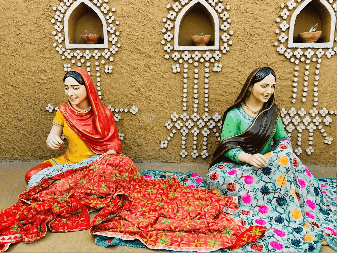 Women doing Fulkari Art