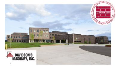 Modern masonry building with Davidson's Masonry logo and certification.