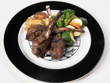 Grilled lamb chops with roasted potatoes and vegetables on the Avanti plate