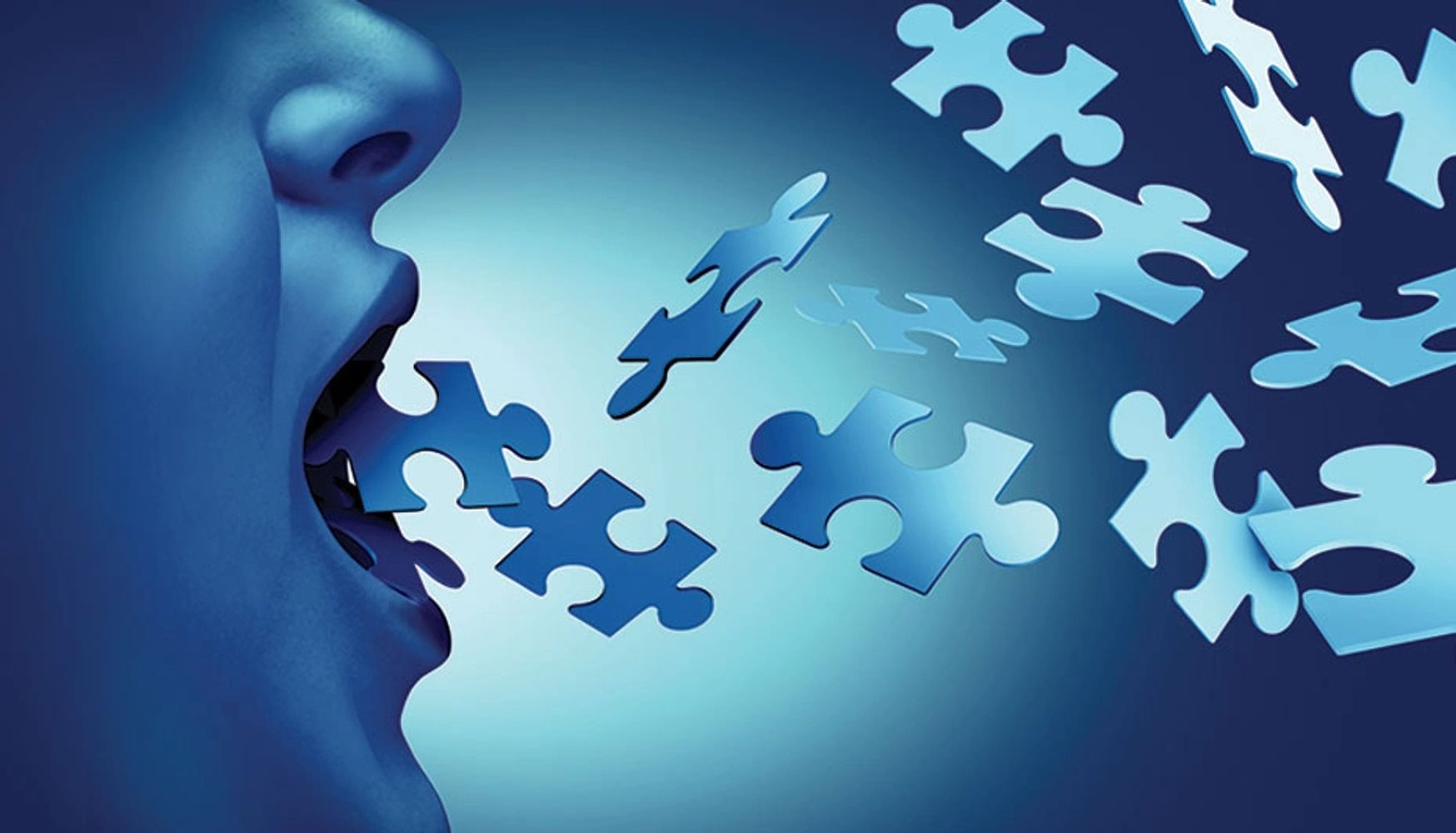 Blue face releasing puzzle pieces from its mouth into the air.