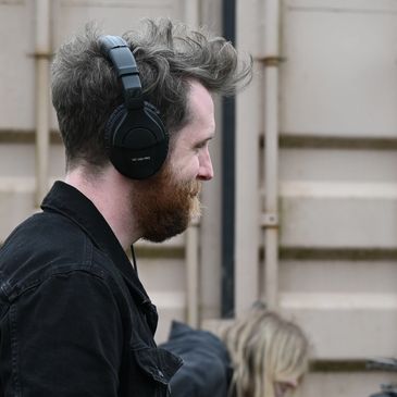 A behind the scenes sot of a camera crew on a video production