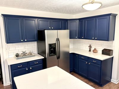 We prep, clean, sand, prime, and spray your cabinets for a smooth, professional finish.