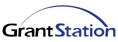 Blue and black logo with the words 'Free Station' and a curved line above it.