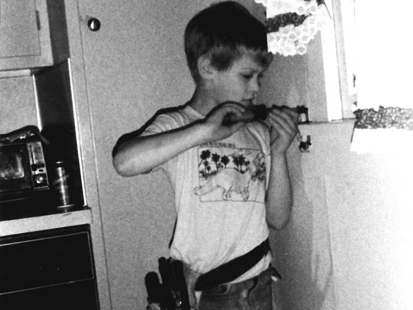 a child working with wood