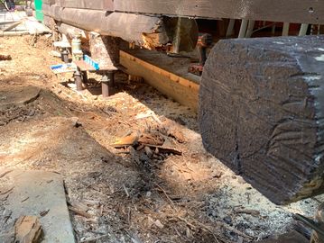 Sill logs are carefully removed 