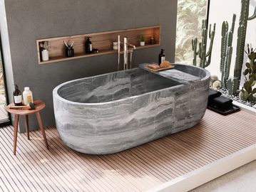 hand-carved marble bathtub made from a single block of natural stone, designed for luxury interiors