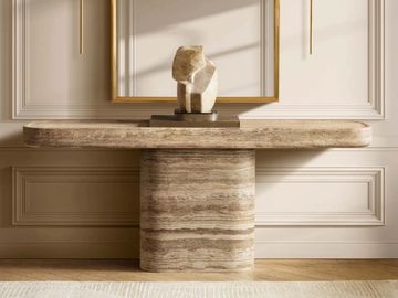 modern travertine console table with sculptural base designed for elegant interiors