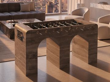 luxury marble foosball table crafted from a single block, designed for high-end interiors