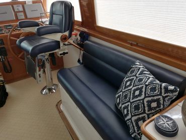 Grand Banks yacht with ultraleather vinyl, stidd chair