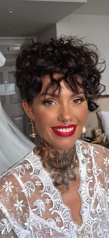 Vintage bridal makeup red lip and pinned curly hair updo AC Hotel Glasgow
Alternative tattooed bride