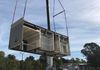 Hoisting modules into place.