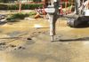 Demo at broken water main.