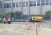 Paving the parking lot.