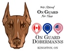 On Guard Dobermanns
