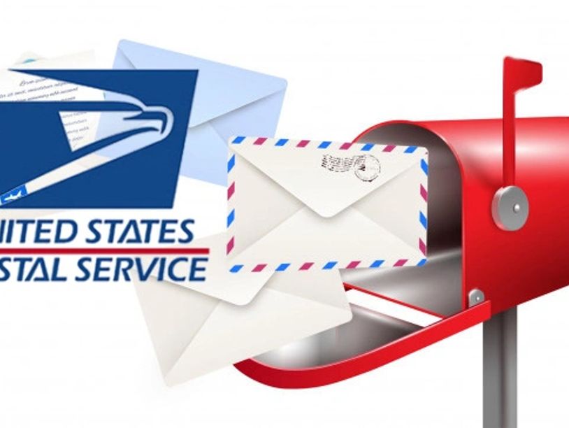 USPS mailbox with letters and logo.