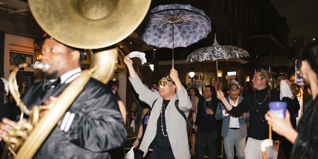 Expert New Orleans wedding planners have the most fun!  Incorporate a second line for your wedding!  