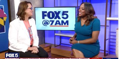 Two women in a TV studio during a FOX 5 morning show.