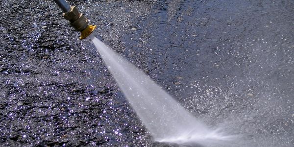 Power washing all concrete and stone surfaces 