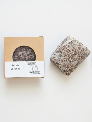 Purple Essence soap bar and its packaging.
